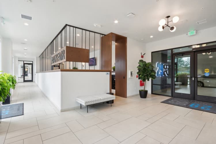 Milwaukee County apartments for rent - image - A reception area with a white reception desk and a bench