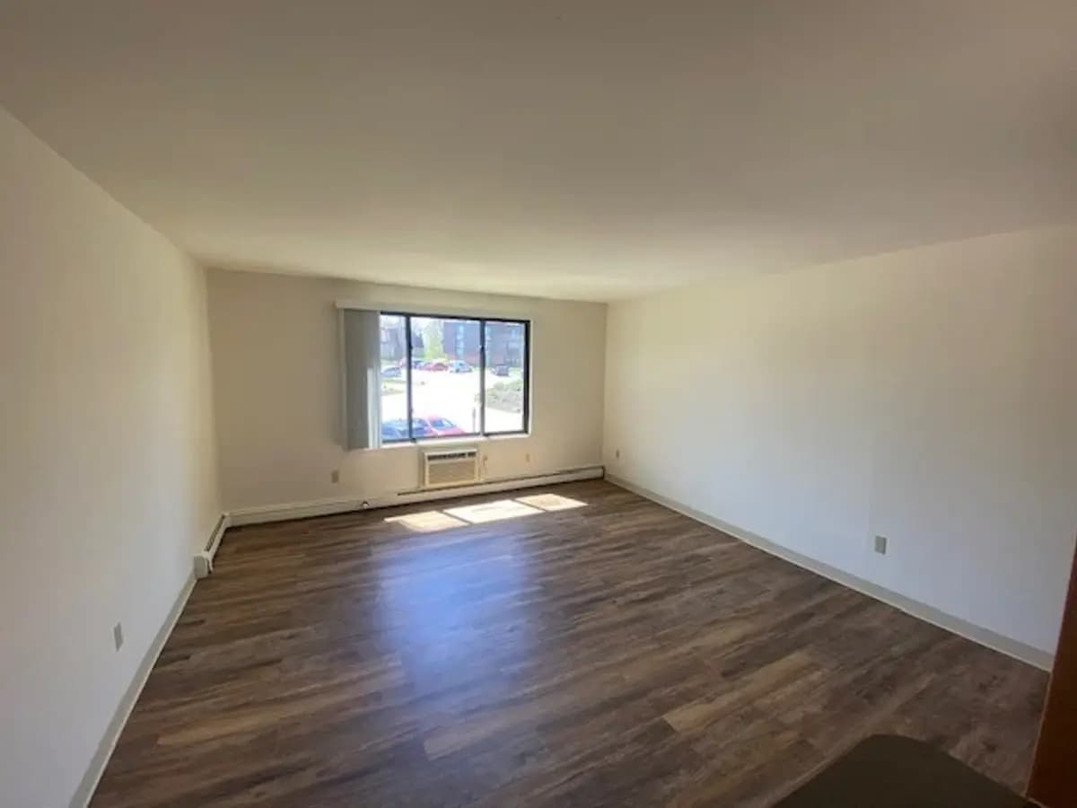 undefined apartments for rent - image - 1bd-living-room.webp