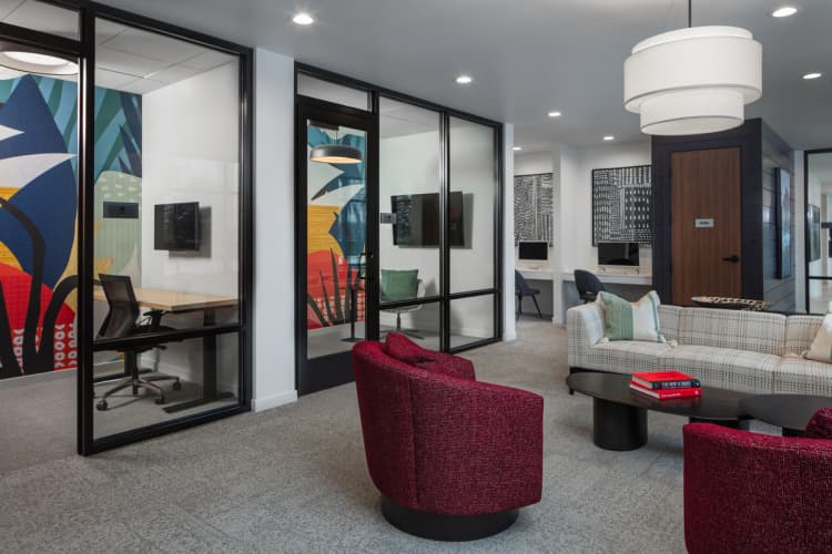 Milwaukee County apartments for rent - image - a lounge area with chairs and couches and a table