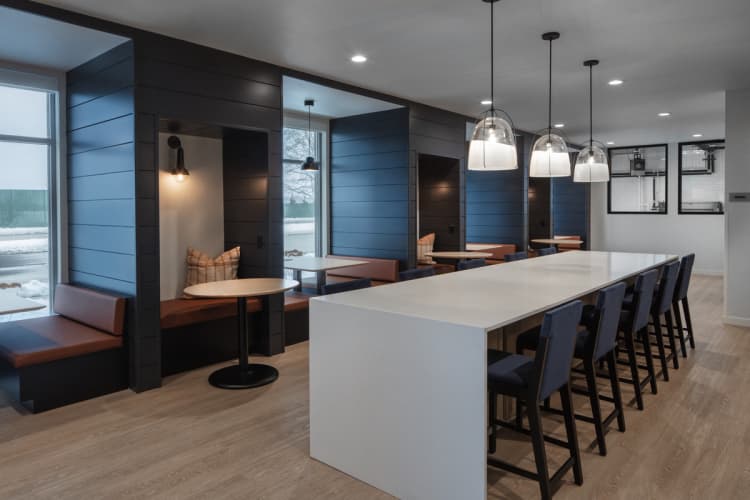 Milwaukee County apartments for rent - image - a long white counter in a restaurant with blue walls and chairs