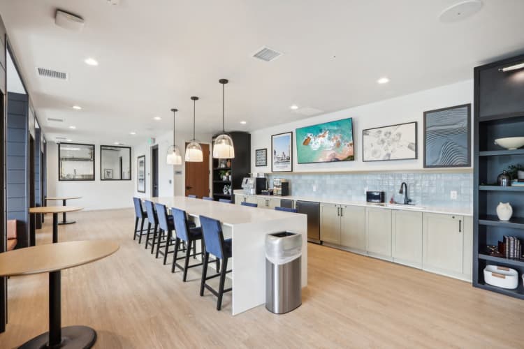 Milwaukee County apartments for rent - image - A modern kitchen with a long island and chairs