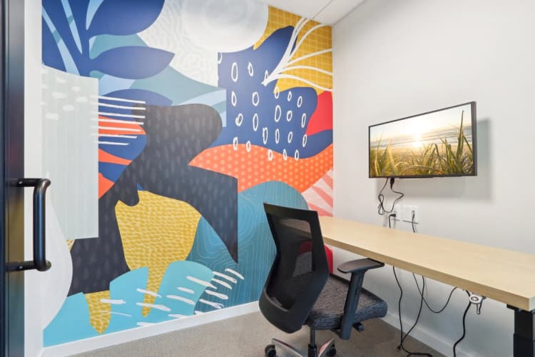 Milwaukee County apartments for rent - image - A modern office with a colorful mural on the wall