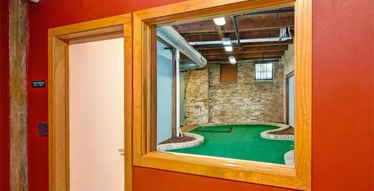 Milwaukee County apartments for rent - image - Historic Fifth Ward Lofts - Golf room.webp