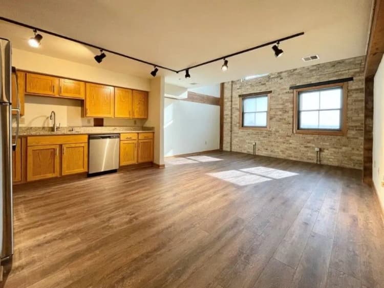 Milwaukee County apartments for rent - image - Historic Fifth Ward Lofts - Kitchen and living room.webp