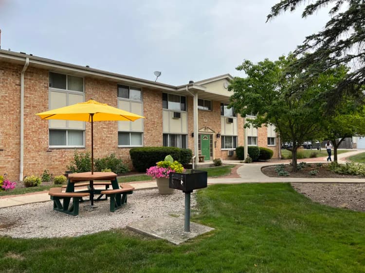 undefined apartments for rent - image - flowers-courtyard-green-door-2023_orig.jpg