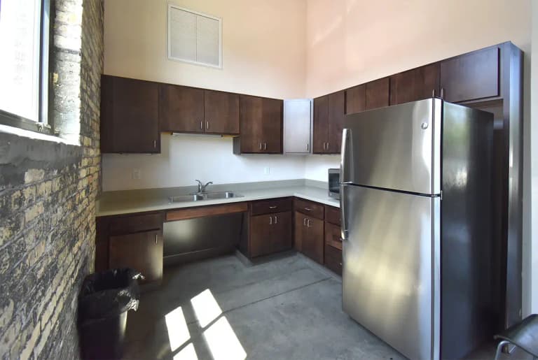 undefined apartments for rent - image - Community-Room-Kitchen-SM.jpg