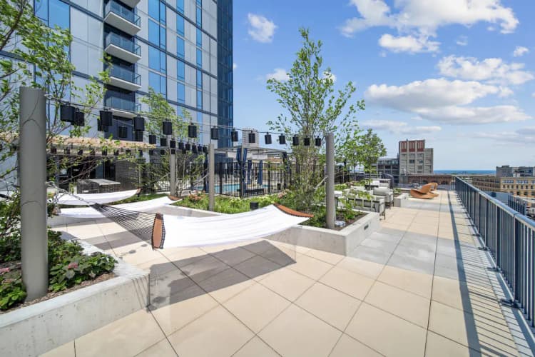 undefined apartments for rent - image - 333Water_Ext_Amenity_HammockGarden_July2024-2.jpg