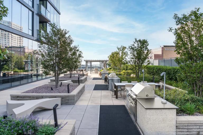 undefined apartments for rent - image - 7SEVENTY7_Ext_Amenities_GrillArea2_KyleSzef_Oct023.jpg