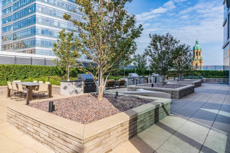 undefined apartments for rent - image - 7SEVENTY7_Ext_Amenities_GrillArea_KyleSzef_Oct2023.jpg