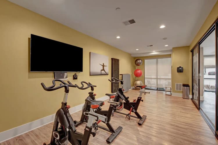 undefined apartments for rent - image - weidner-wisconsin_river-house_amenity_interior_fitness-center-2.webp
