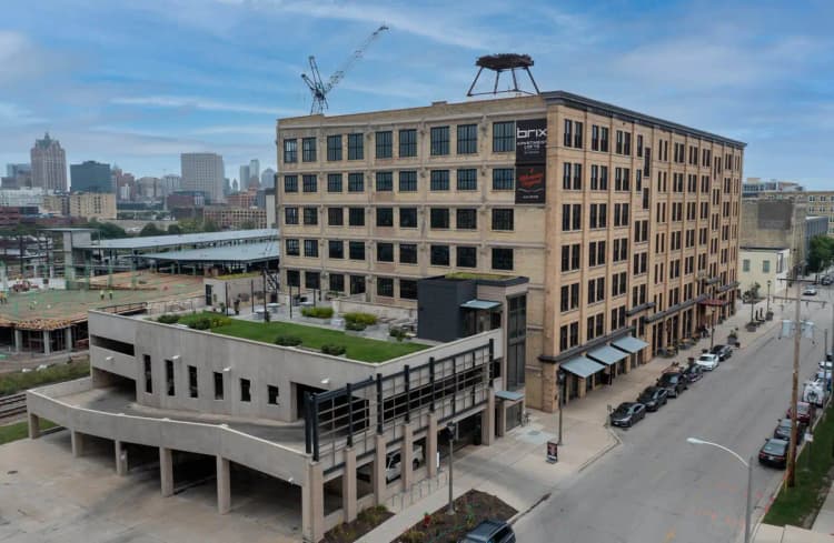 undefined apartments for rent - image - Exterior-Parking-Garage-and-Community-Skyline.jpg